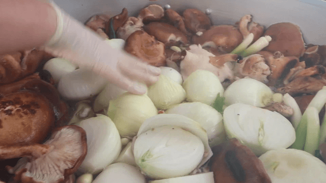 Ingredients being prepared in a large pot