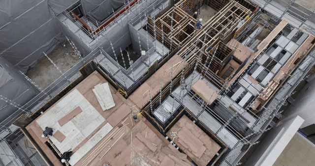 Construction site with scaffolding and materials