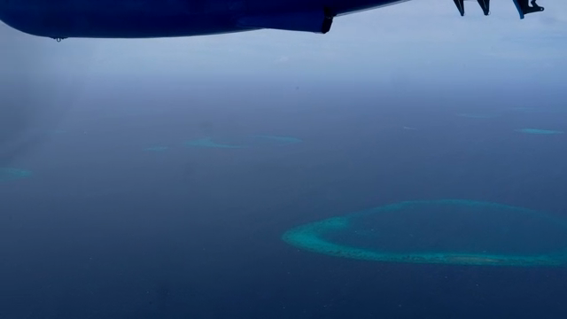 Aerial view of ocean and coral reefs