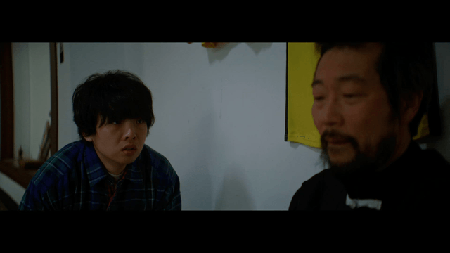 Two people having a serious conversation