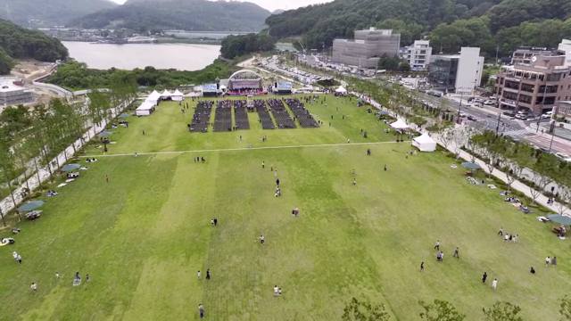 A large outdoor event in a city park