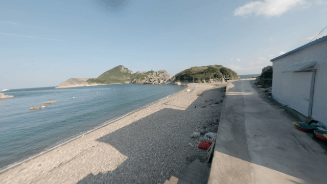 Coastal path with a view of the sea and mountains