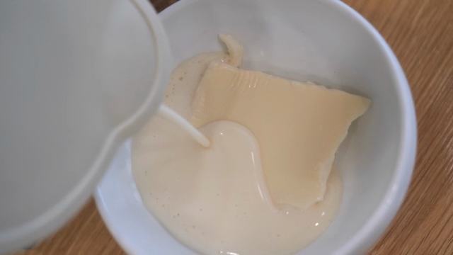 Soft tofu being poured with soybean soup