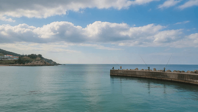 Sea with people fishing on pier