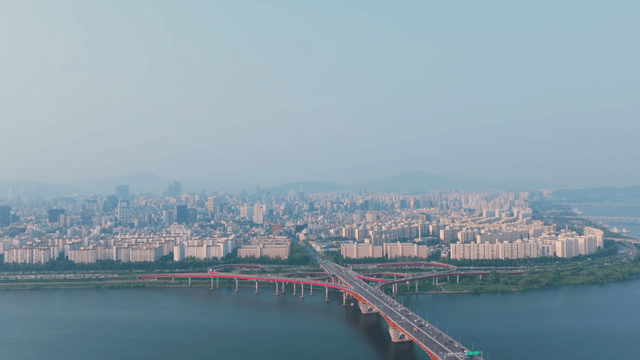 Seoul cityscape with Han River and grand bridge