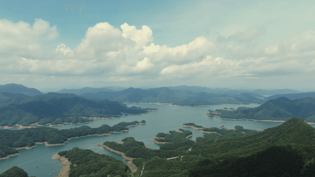 Vast lake surrounded by lush mountains