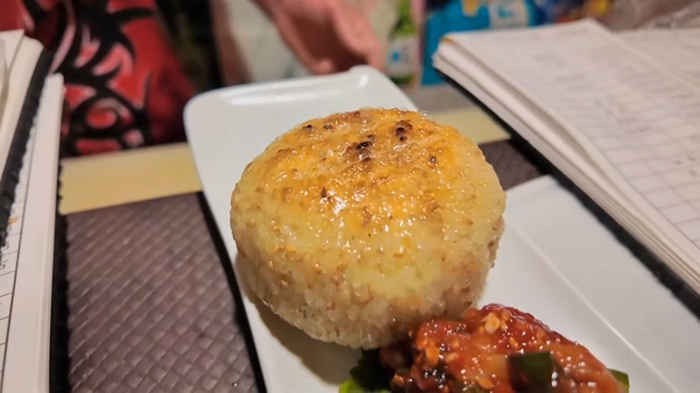 Grilled rice balls on a plate