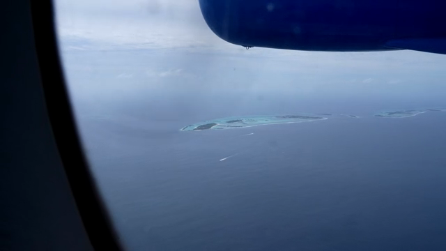 View of islands from an airplane window