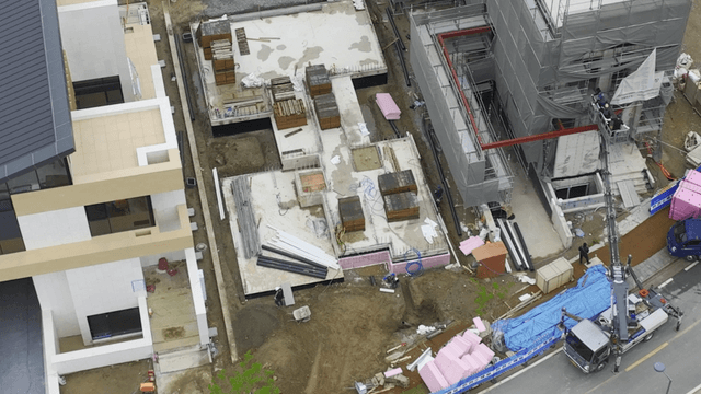 Construction site with buildings and equipment