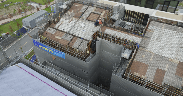 Construction site with scaffolding and workers