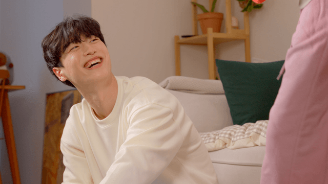 Couple organizing clothes together