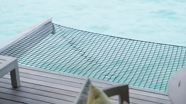 A relaxing deck over clear blue water