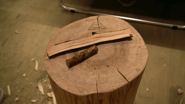 Wooden logs serving as a base for placing wood pieces