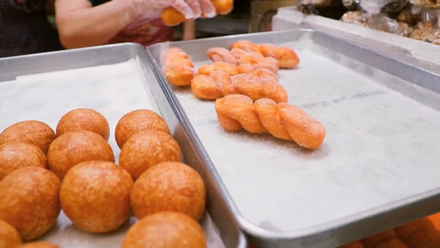 Freshly made Korean donuts on trays