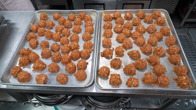 Dough balls prepared on a tray