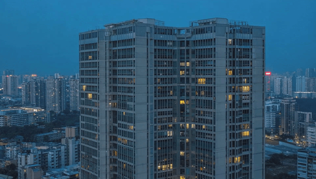 Tall buildings in a city at night