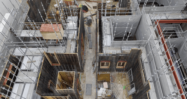 Construction site with scaffolding and materials