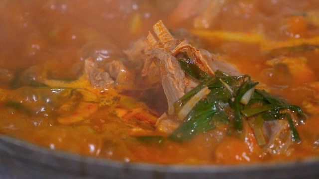 A pot of spicy stew boiling