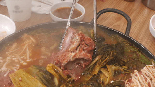 Tender outer leaves pork back-bone stew with meat and vegetables