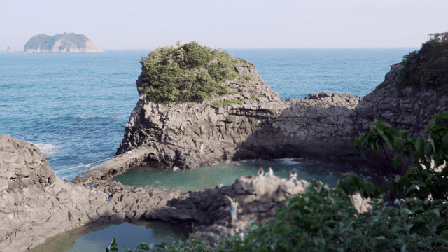 Rocky coastal area with clear blue sea
