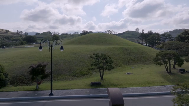 A serene park with ancient stone structures