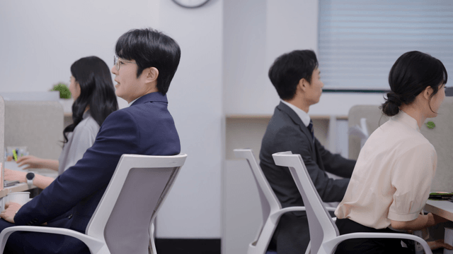 Office workers focused on their tasks