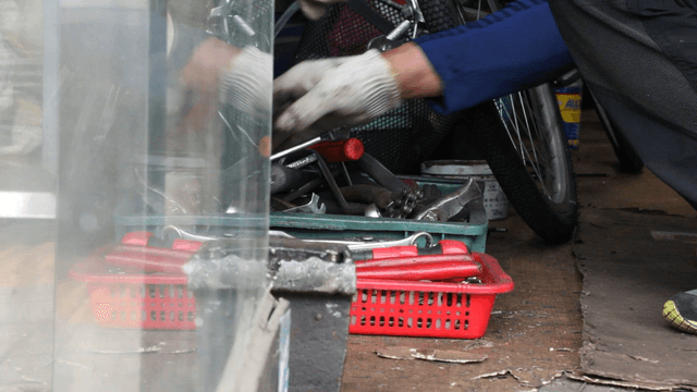 Person working with tools in a workshop