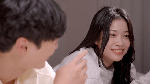 Couple talking warmly while lying down