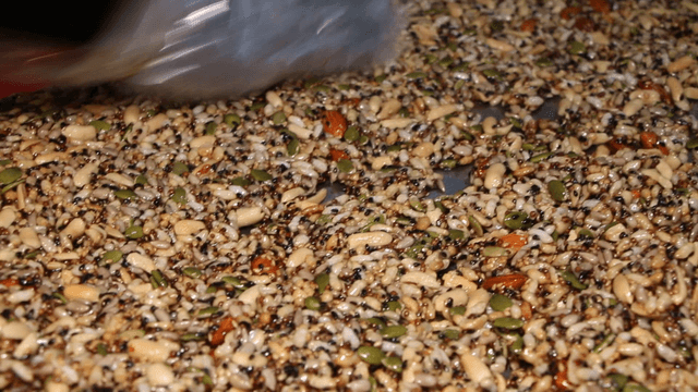 Process of flattening sweet nuts puffs to make it