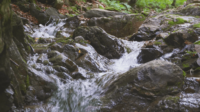 A small valley flowing over rocks