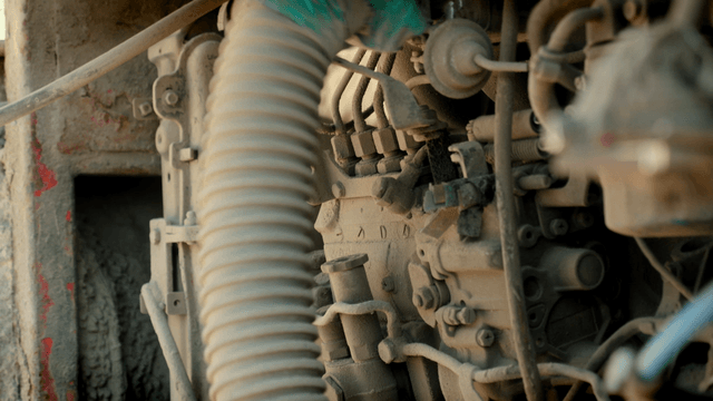 Close-up of a dusty machine engine