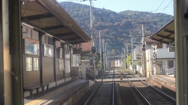 Train tracks passing through a small Japanese town