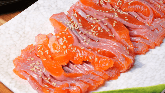 Fresh salmon and trout sashimi on plate
