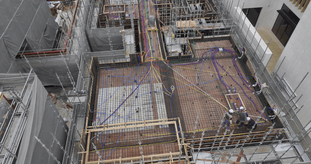 Construction site with scaffolding and workers