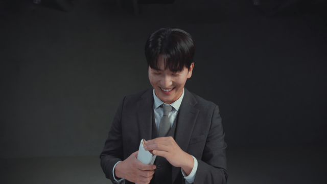 Man receiving an envelope of money