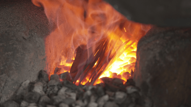 Intense flames in a metal forge