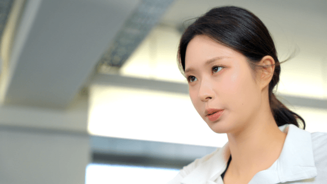 Woman exercising at gym with focus