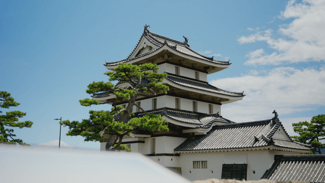 Traditional Japanese castle under a clear sky