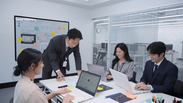 Team discussing project in a meeting room