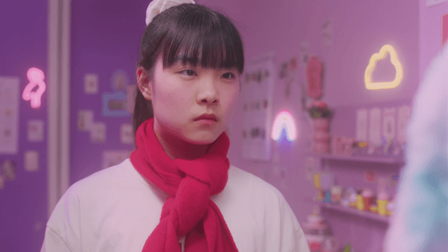 Girl staring at something in a fancy room