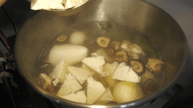 Cabbage cores added to boiling broth