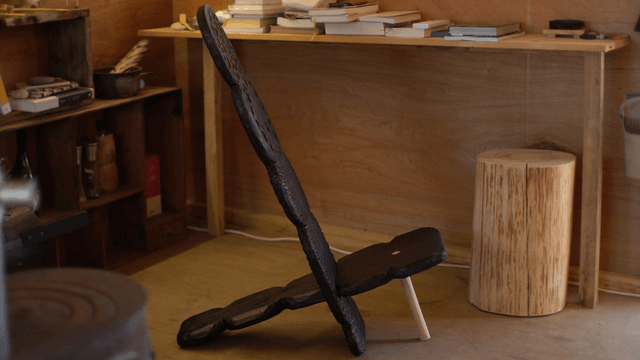 Wooden interior with books and chair