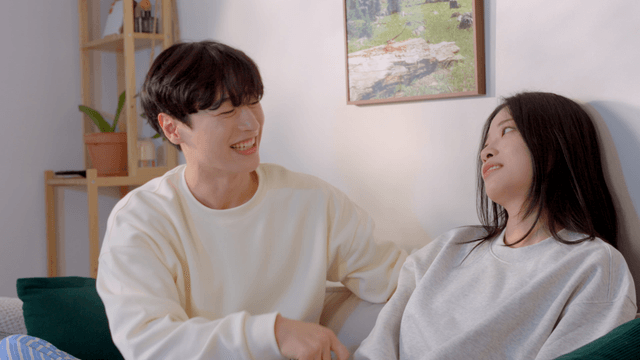 Couple enjoying video console games at home