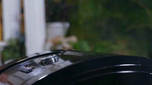 A grill with a temperature gauge