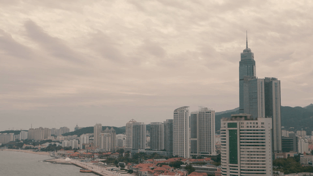 Coastal city skyline with tall buildings