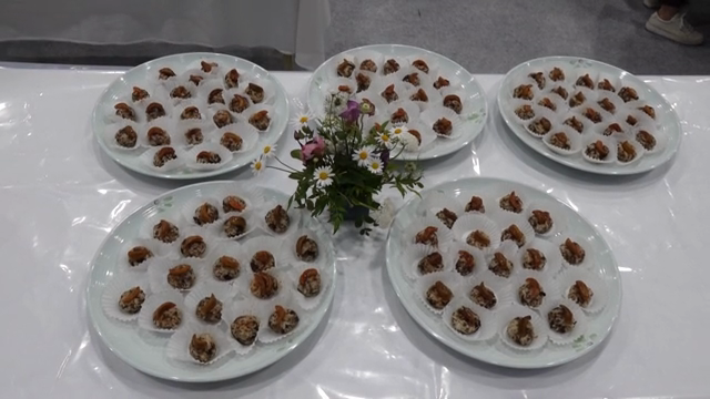 Plates of Korean sweet rice with nuts and jujubes with flowers