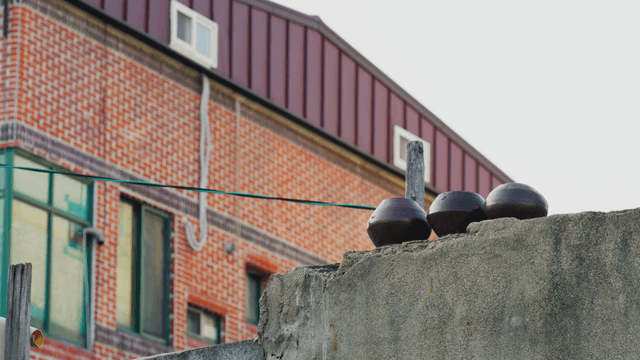 Traditional Korean jars on a rooftop