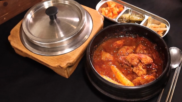 Korean spicy braised chicken with side dishes