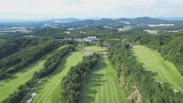 Aerial view of a lush green golf course
