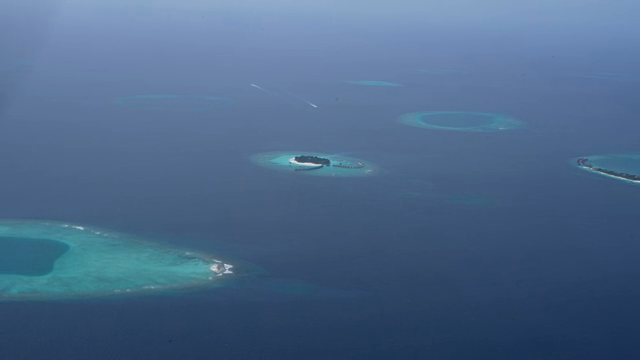Islands surrounded by clear blue ocean